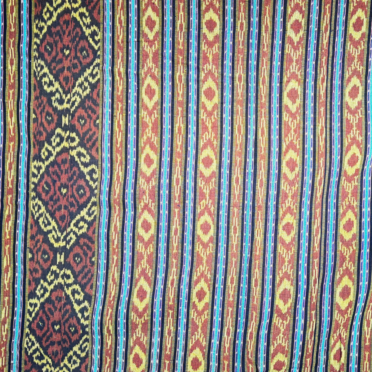 Handwoven Ikat Cotton Tapestry: Indonesian Octopus Motif Wall Hanging