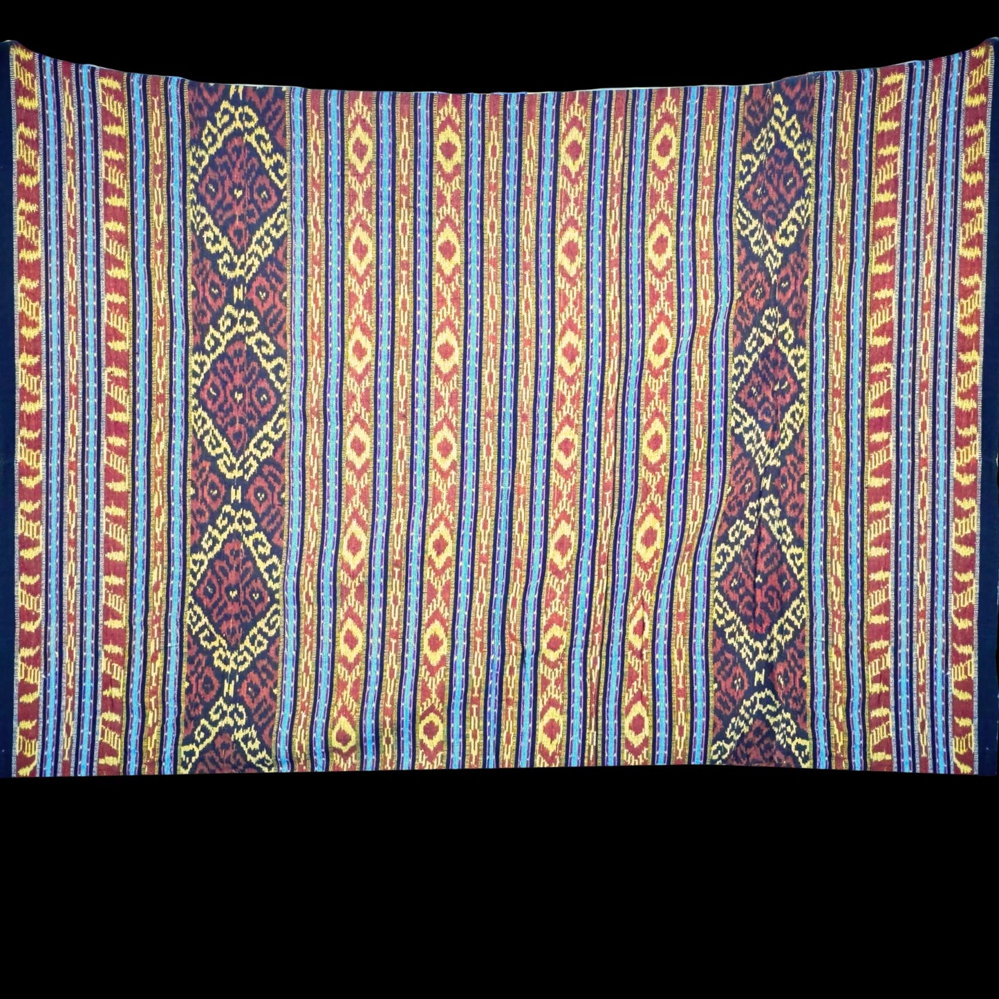 Handwoven Ikat Cotton Tapestry: Indonesian Octopus Motif Wall Hanging